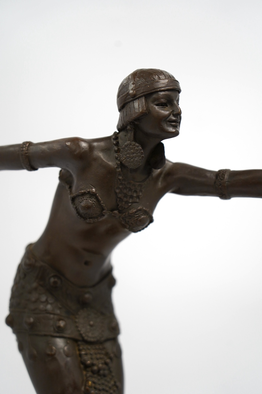 After Demétre H. Chiparus (Romanian, 1886-1947), an Art Deco bronze figure of a dancer, on stepped marble base, 48cm. Condition - fair